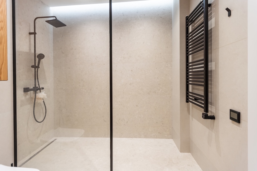 sleek modern shower with black fixtures and tile 2026 03 17 06 21 44 utc